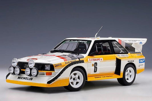 🚗 Rendelésre – Audi Quattro Sport S1 (Night Version) 1986 – Sárga-Fehér-Piros – 1:18 AutoArt