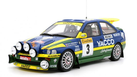 🚗 Rendelésre érkezik – Ford Escort RS Cosworth Team Alliance Yacco (Night Version) #3 – Rally Monte Carlo 1996 Győztes – P. Bernardini & B. Occelli – Kék/Sárga – 1:18 Otto-mobile